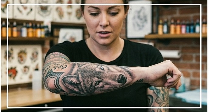 Colorful traditional tattoo on upper arm